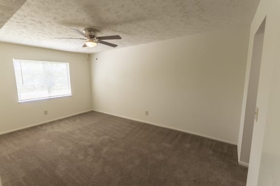 This is a photo of the master bedroom in the 938 square foot, 2 bedroom, 1 and a half bath apartment at Blue Grass Manor Apartments in Erlanger, KY