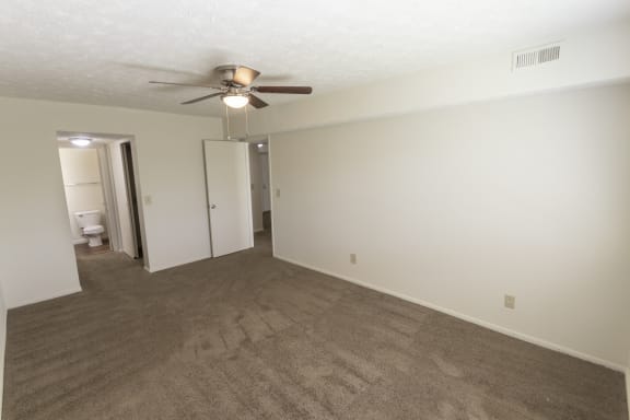This is a photo of the master bedroom in the 938 square foot, 2 bedroom, 1 and a half bath apartment at Blue Grass Manor Apartments in Erlanger, KY