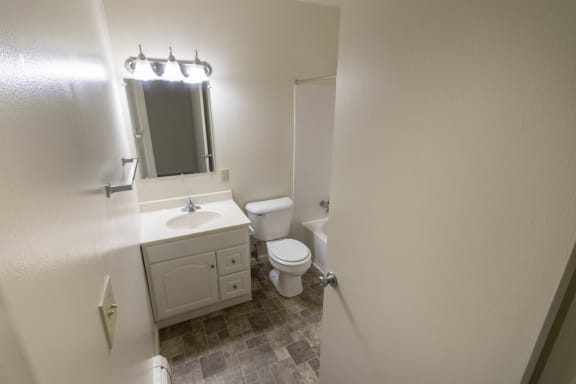 This is a photo of the bathroom in the 865 square foot, 2 bedroom, 1 and a half bath apartment at Blue Grass Manor Apartments in Erlanger, KY.