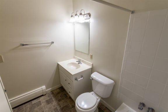 This is a photo of the bathroom in the 865 square foot, 2 bedroom, 1 and a half bath apartment at Blue Grass Manor Apartments in Erlanger, KY.