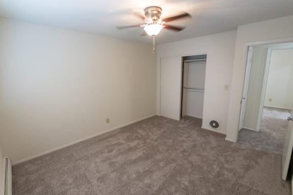This is a photo of the bedroom in the 865 square foot, 2 bedroom, 1 and a half bath apartment at Blue Grass Manor Apartments in Erlanger, KY.