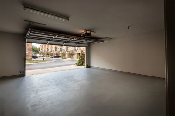 This is a photo of the 2-car garage with direct access to the 1486 square foot 3 bedroom, 3 bath floor plan at The Brownstones Townhome Apartments in Dallas, TX.