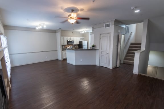 This is a photo of the entryway and stairwell to the third floor of the 1486 square foot 3 bedroom, 3 bath floor plan at The Brownstones Townhome Apartments in Dallas, TX.