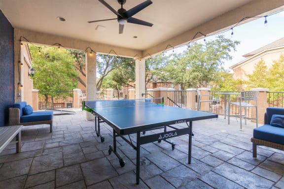 This is a photo of the ping pong table on the game deck at The Brownstones Townhome Apartments in Dallas, TX.
