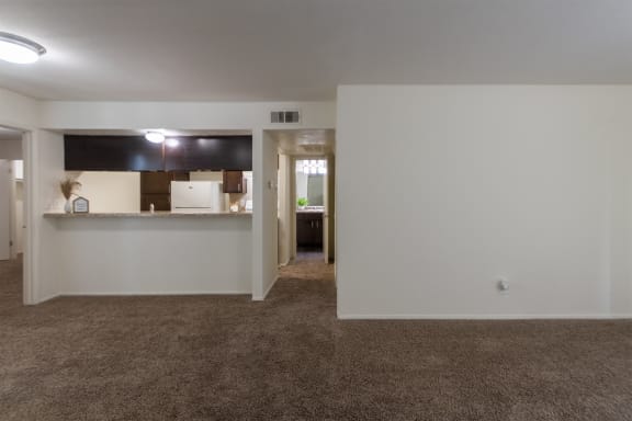 Carpeted Living And Kitchen at The Biltmore, Dallas, Texas
