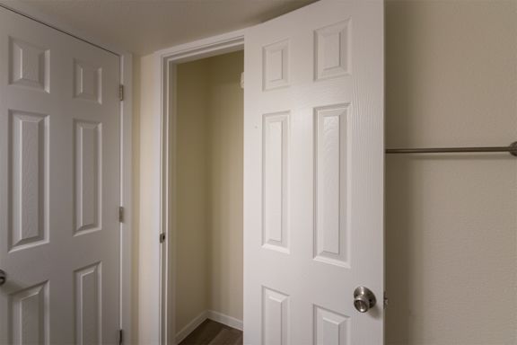 Primary bathroom storage closest in a 2 bedroom, 2 bath 991 sq ft apartment home at The Biltmore Apartments located in the Vickery Midtown neighborhood of Dallas, TX.