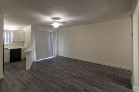 This is a photo of the living area in the 450 square foot efficiency apartment at Cambridge Court Apartments in Dallas, TX.