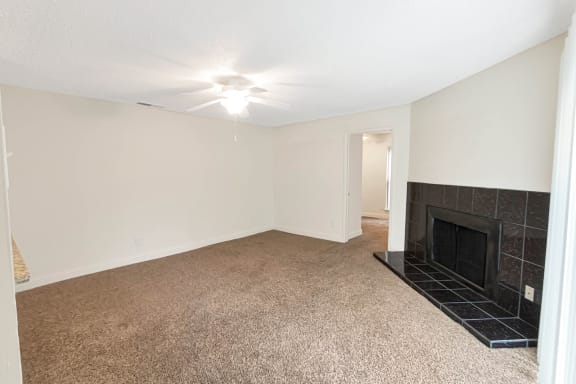 This is a photo of the living room in the 982 square foot 1 bedroom, 1 bath apartment at Cambridge Court Apartments in Dallas, TX.