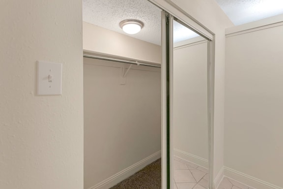 This is a photo of the entryway closet in the 982 square foot 1 bedroom, 1 bath apartment at Cambridge Court Apartments in Dallas, TX.