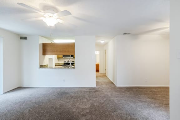 This is a photo of the living room in the 1245 square foot 2 bedroom, 2 bath apartment at Cambridge Court Apartments in Dallas, TX.