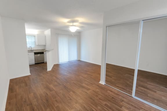 This is a photo of the living area in the 450 square foot efficiency apartment at Cambridge Court Apartments in Dallas, TX.