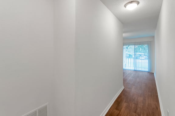 This is a photo of the entryway in the 450 square foot efficiency apartment at Cambridge Court Apartments in Dallas, TX.