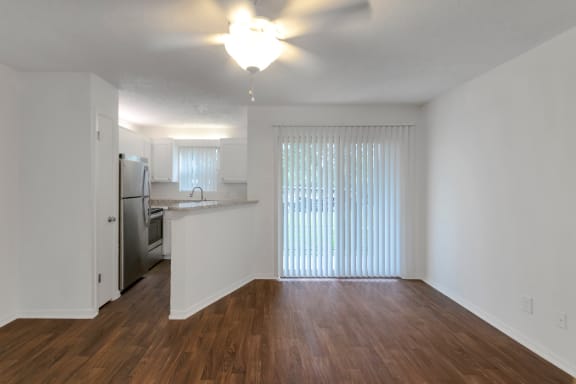This is a photo of the living area in the 450 square foot efficiency apartment at Cambridge Court Apartments in Dallas, TX.