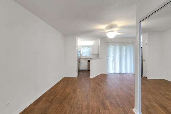 This is a photo of the living area in the 450 square foot efficiency apartment at Cambridge Court Apartments in Dallas, TX.