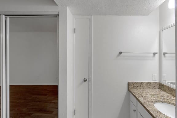 This is a photo of the bathroom in the 450 square foot efficiency apartment at Cambridge Court Apartments in Dallas, TX.