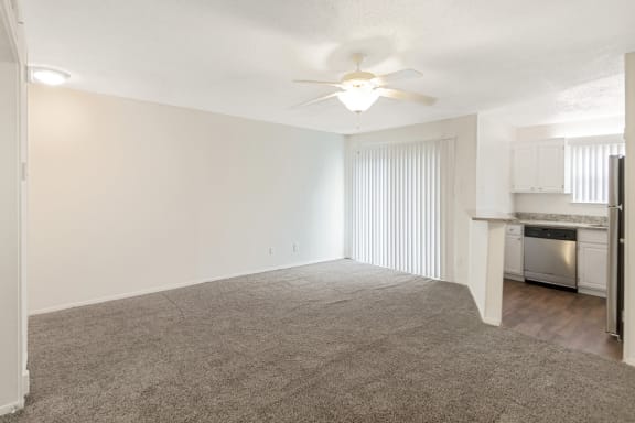 This is a photo of the living area in the 450 square foot efficiency apartment at Cambridge Court Apartments in Dallas, TX.