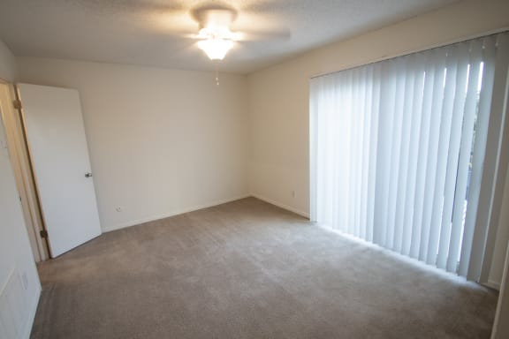 This is a photo of the bedroom of a 582 square foot 1 bedroom apartment at Cambridge Court Apartments in Dallas, TX.