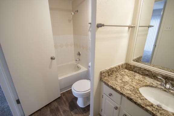 This is a photo of the bathroom of a 612 square foot 1 bedroom apartment at Cambridge Court Apartments in Dallas, TX.