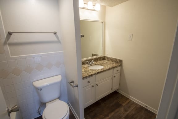 This is a photo of the bathroom of a 612 square foot 1 bedroom apartment at Cambridge Court Apartments in Dallas, TX.