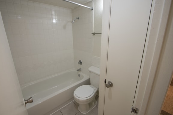 This is a photo of the master bathroom of a 1086 square foot 2 bedroom  apartment at Cambridge Court Apartments in Dallas, TX.