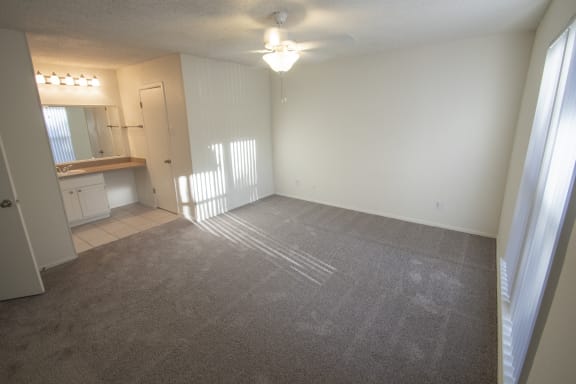 This is a photo of the master bedroom of a 1086 square foot 2 bedroom  apartment at Cambridge Court Apartments in Dallas, TX.