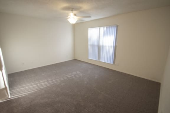 This is a photo of the master bedroom of a 1086 square foot 2 bedroom  apartment at Cambridge Court Apartments in Dallas, TX.