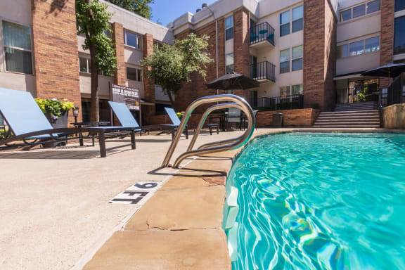 This is a photo of the primary pool area at Cambridge Court Apartments in Dallas, TX.