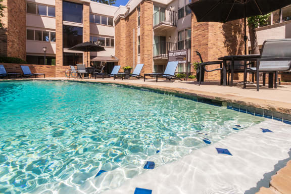 This is a photo of the primary pool area at Cambridge Court Apartments in Dallas, TX.