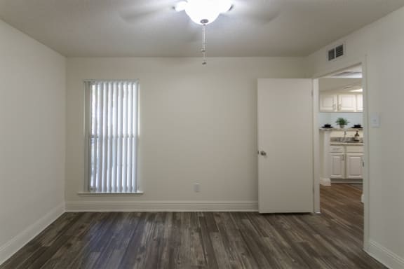 This is a photo of the bedroom of the 575 square foot 1 bedroom, 1 bath apartment at Canyon Creek Apartments in Dallas, TX