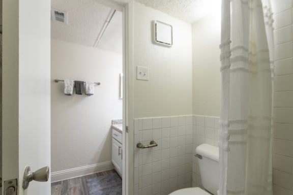 This is a photo of the water closet of the 575 square foot 1 bedroom, 1 bath apartment at Canyon Creek Apartments in Dallas, TX