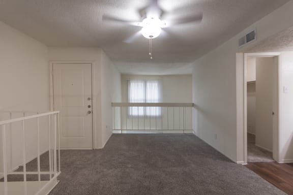 This is a photo of the loft/bedroom in a 717 square foot 1 bedroom, 1 bath apartment at Canyon Creek Apartments in Dallas, TX