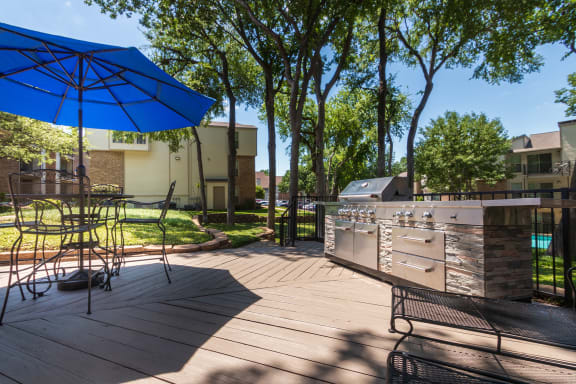 This is a photo of BBQ area/patio at Canyon Creek Apartments in Dallas, TX.
