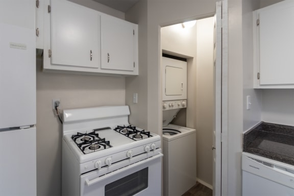 This is a photo of the kitchen of the 1004 square foot, 2 bedroom/1 bath Townhome with stackable washer/dryer floor plan at Colonial Ridge Apartments in the Pleasant Ridge neighborhood of Cincinnati, OH.