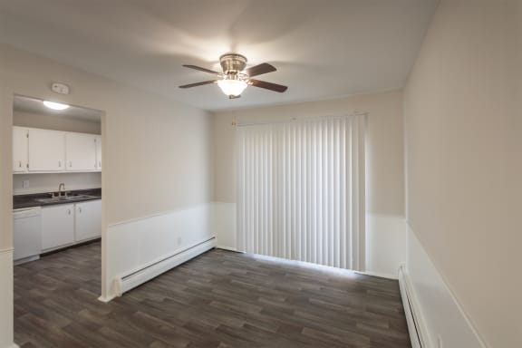 This is a photo of the dining room of the 1004 square foot, 2 bedroom/1 bath Townhome with stackable washer/dryer floor plan at Colonial Ridge Apartments in the Pleasant Ridge neighborhood of Cincinnati, OH.
