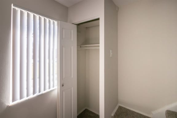 This is a photo of the living room closet of the 1004 square foot, 2 bedroom/1 bath Townhome with stackable washer/dryer floor plan at Colonial Ridge Apartments in the Pleasant Ridge neighborhood of Cincinnati, OH.