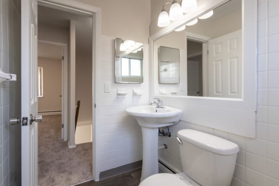 This is a photo of the bathroom of the 1004 square foot, 2 bedroom/1 bath Townhome with stackable washer/dryer floor plan at Colonial Ridge Apartments in the Pleasant Ridge neighborhood of Cincinnati, OH.