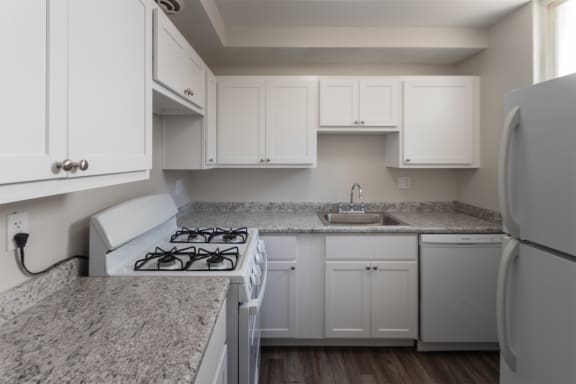 This is a photo of the kitchen in the 631 square foot, 1 bedroom/1 bath Montgomery floor plan at Colonial Ridge Apartments in the Pleasant Ridge neighborhood of Cincinnati, OH.