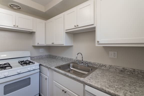 This is a photo of the kitchen in the 631 square foot, 1 bedroom/1 bath Montgomery floor plan at Colonial Ridge Apartments in the Pleasant Ridge neighborhood of Cincinnati, OH.