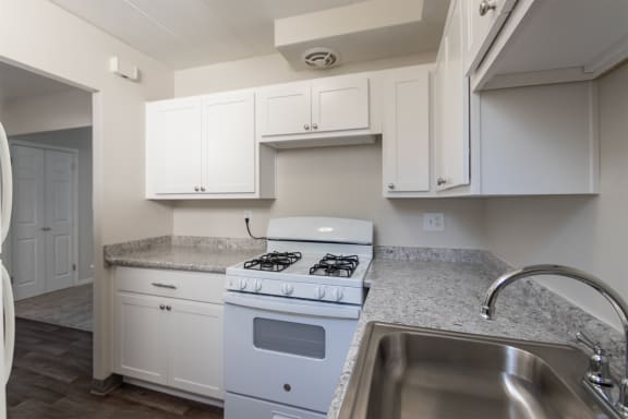This is a photo of the kitchen in the 631 square foot, 1 bedroom/1 bath Montgomery floor plan at Colonial Ridge Apartments in the Pleasant Ridge neighborhood of Cincinnati, OH.