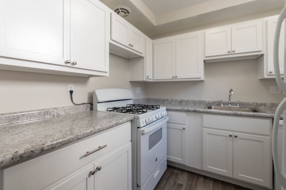 This is a photo of the kitchen in the 631 square foot, 1 bedroom/1 bath Montgomery floor plan at Colonial Ridge Apartments in the Pleasant Ridge neighborhood of Cincinnati, OH.