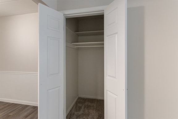 This is a photo of one of the two living room closets in the 631 square foot, 1 bedroom/1 bath Montgomery floor plan at Colonial Ridge Apartments in the Pleasant Ridge neighborhood of Cincinnati, OH.