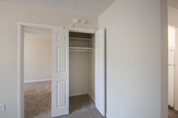 This is a photo of one of the two living room closets in the 631 square foot, 1 bedroom/1 bath Montgomery floor plan at Colonial Ridge Apartments in the Pleasant Ridge neighborhood of Cincinnati, OH.