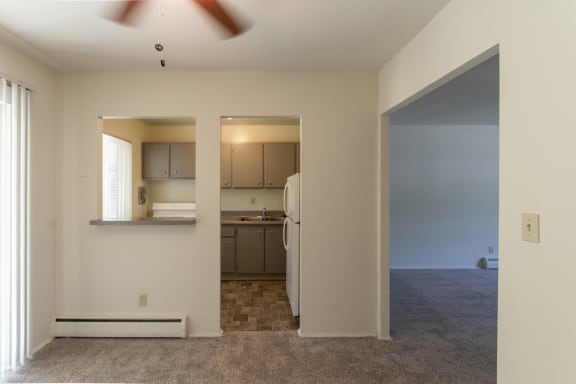 This is a photo looking into the kitchen from the dining room of the 631 square foot, B-style 1 bedroom floor plan at Colonial Ridge Apartments in Cincinnati, OH.