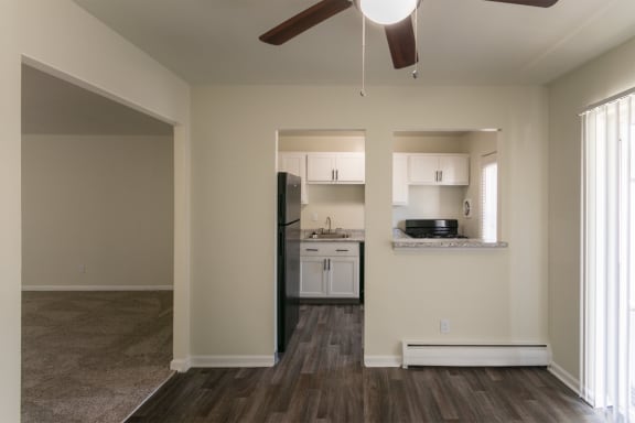This is a photo of the kitchen with pass through window from the dining room of the 631 square foot, B-style (Ranch) 1 bedroom/1 bath floor plan at Colonial Ridge Apartments in the Pleasant Ridge neighborhood of Cincinnati, OH.