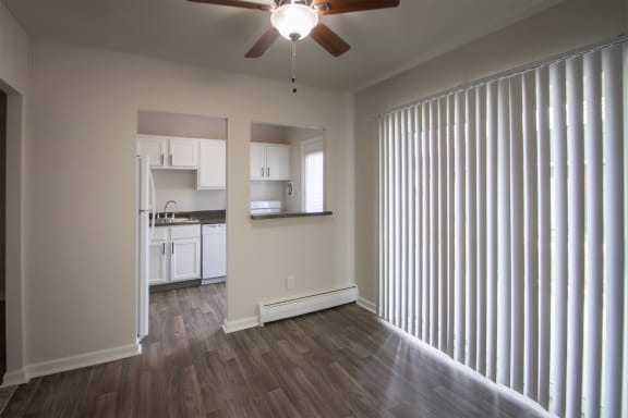 This is a photo of the kitchen with pass through window from the dining room in the 631 square foot, B-style (Ranch) 1 bedroom/1 bath floor plan at Colonial Ridge Apartments in the Pleasant Ridge neighborhood of Cincinnati, OH.
