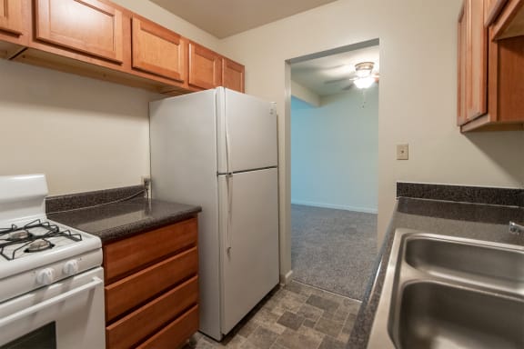 This is a photo of the kitchen in the 620 square foot, 1 bedroom, 1 bath junior floor plan at Colonial Ridge Apartments in the Pleasant Ridge neighborhood of Cincinnati, OH.