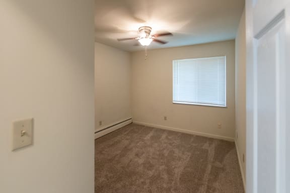 This is a photo of the bedroom in the 620 square foot, 1 bedroom, 1 bath junior floor plan at Colonial Ridge Apartments in the Pleasant Ridge neighborhood of Cincinnati, OH.