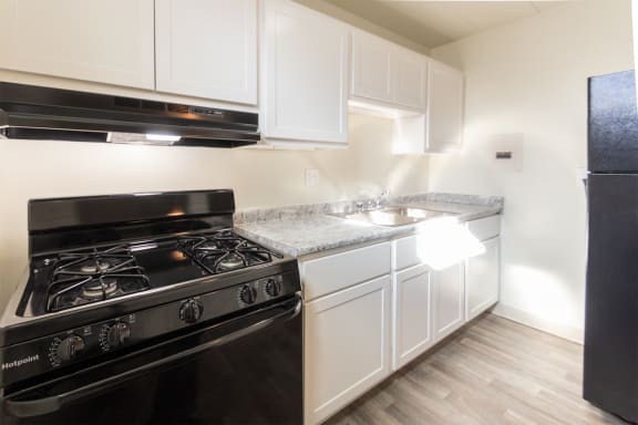 This is a photo of the kitchen in the 550 square foot 1 bedroom, 1 bath patio apartment at College Woods Apartments in the North College Hill neighborhood of Cincinnati, OH.