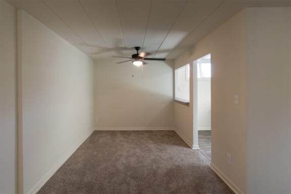 This is a photo of the dining area in the 550 square foot 1 bedroom, 1 bath patio apartment at College Woods Apartments in the North College Hill neighborhood of Cincinnati, OH.