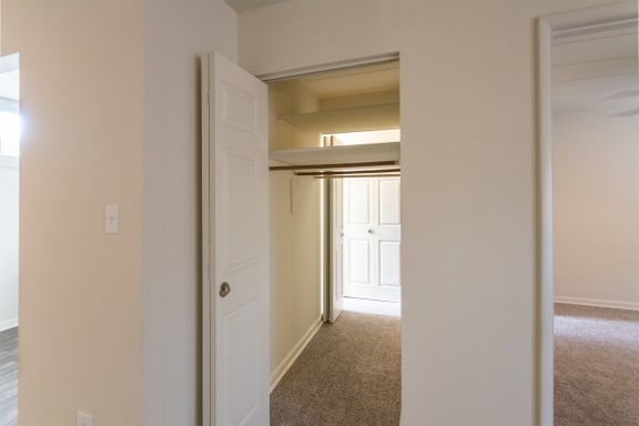 This is a photo of the large closet in the 550 square foot 1 bedroom, 1 bath patio apartment at College Woods Apartments in the North College Hill neighborhood of Cincinnati, OH.